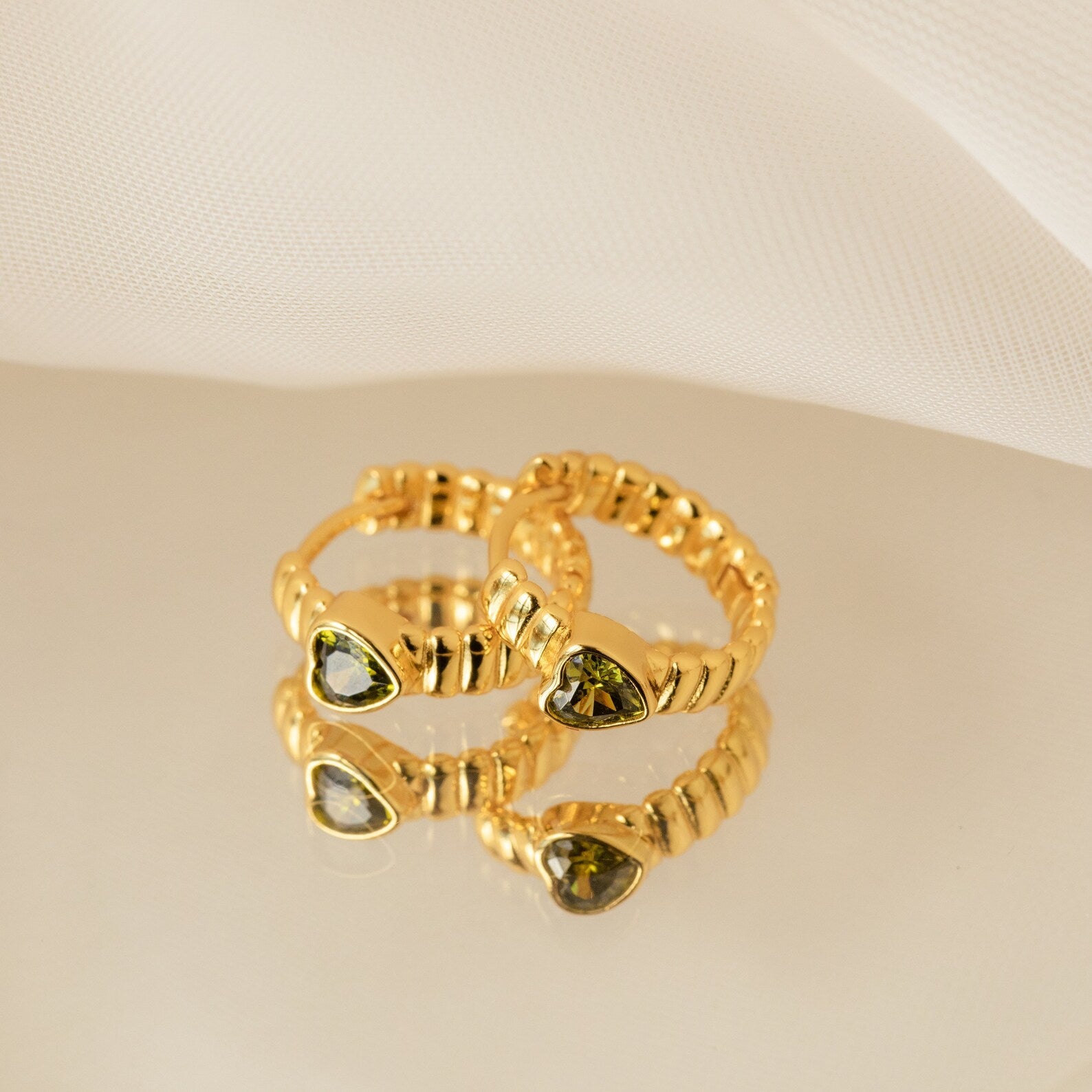 Unique Elegance: Peridot Heart Huggie Earrings 18K Gold