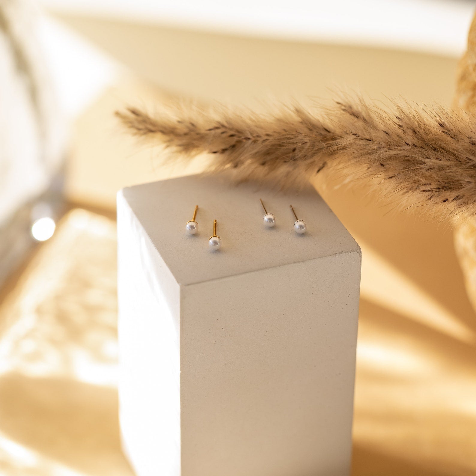 Timeless Elegance: Delicate Pearl Stud Earrings