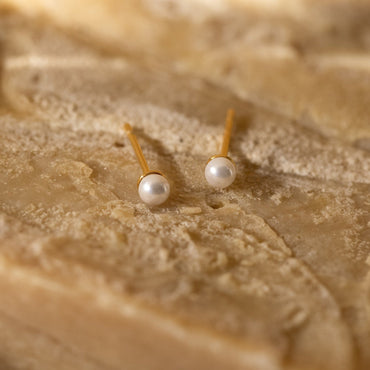 Timeless Elegance: Delicate Pearl Stud Earrings