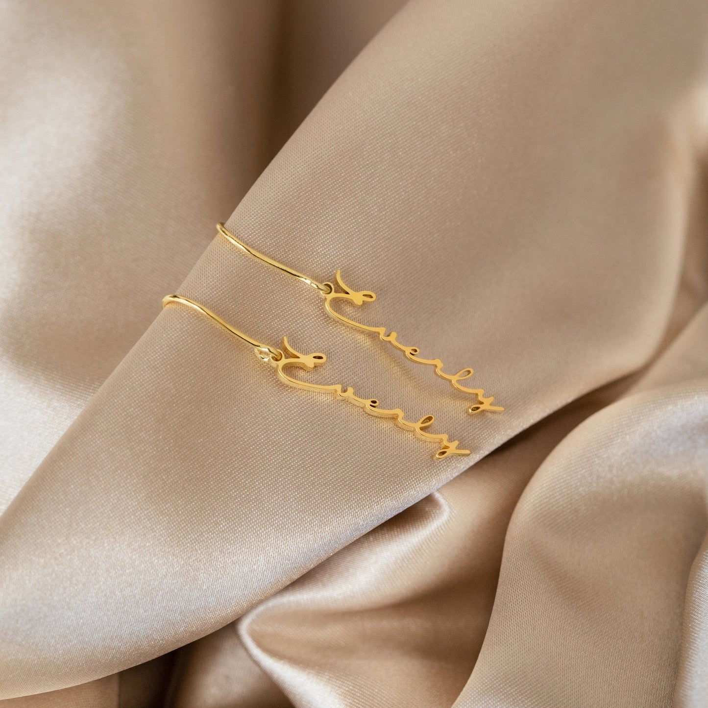 Chic Statement: Minimal Dangling Name Earrings
