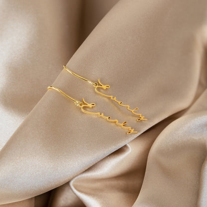 Chic Statement: Minimal Dangling Name Earrings