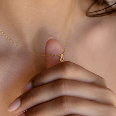 Charming Personalization: Minimalist Initial Necklace