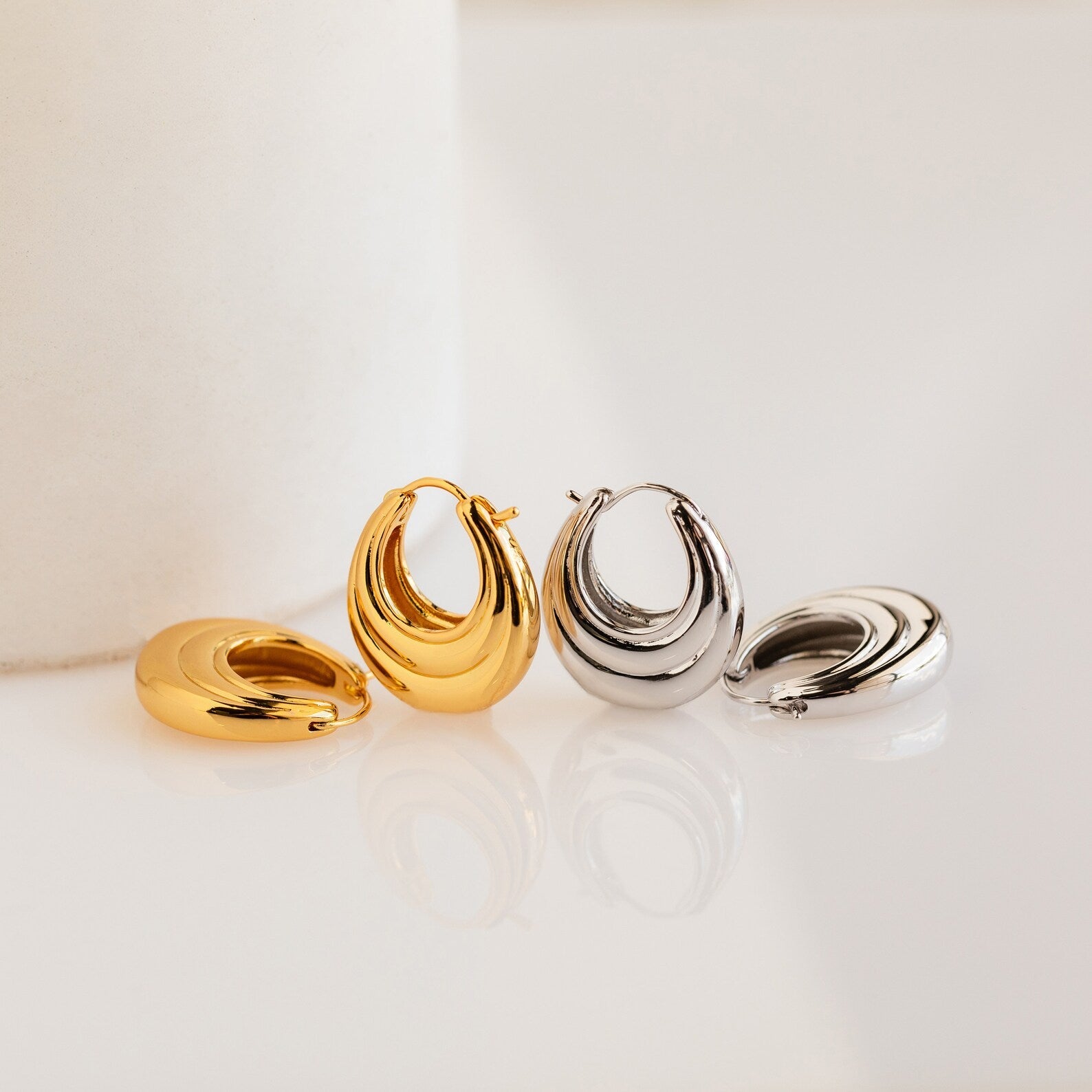 Modern Sophistication: Statement Ribbed Oval Hoop Earrings