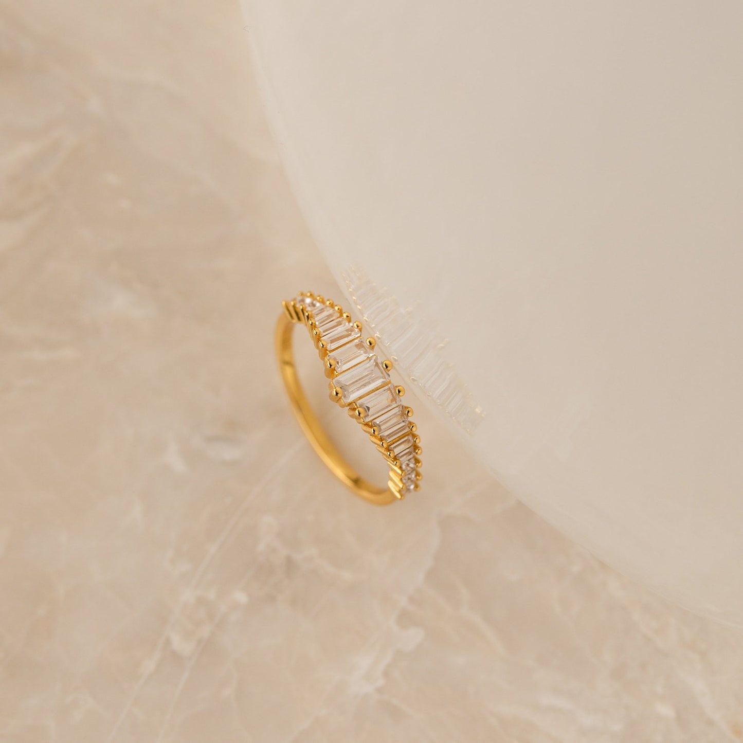 Art Deco Diamond Chandelier Ring, an 18K gold plated sterling silver ring featuring CZ diamonds in a cascading chandelier silhouette, evoking the opulence of the Roaring Twenties