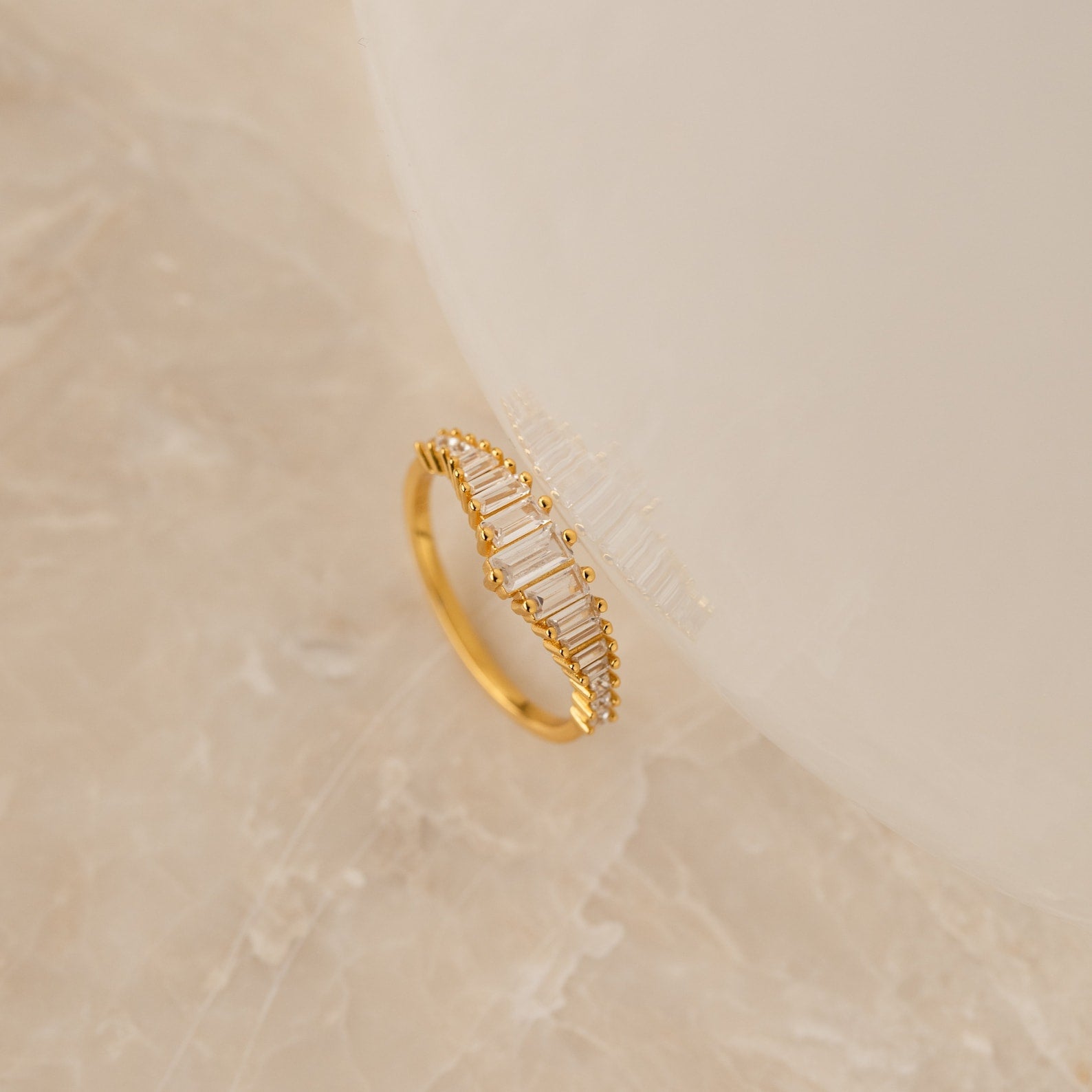 Art Deco Diamond Chandelier Ring, an 18K gold plated sterling silver ring featuring CZ diamonds in a cascading chandelier silhouette, evoking the opulence of the Roaring Twenties