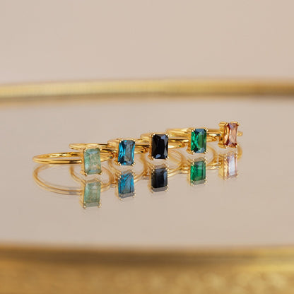 Embrace Vintage Elegance with the Blue Topaz Emerald Ring