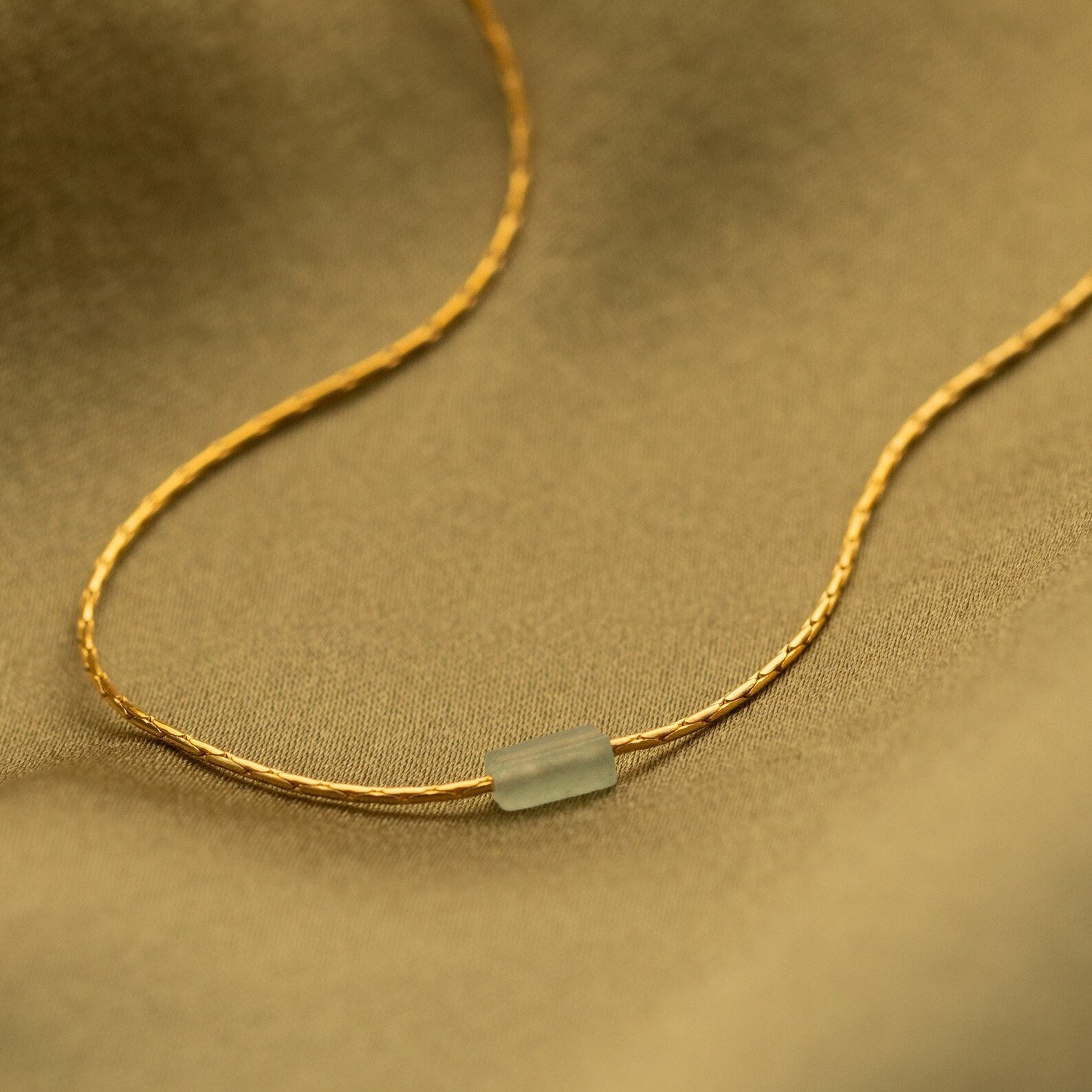 Embrace Serenity and Luck with our Green Crystal Bar Necklace
