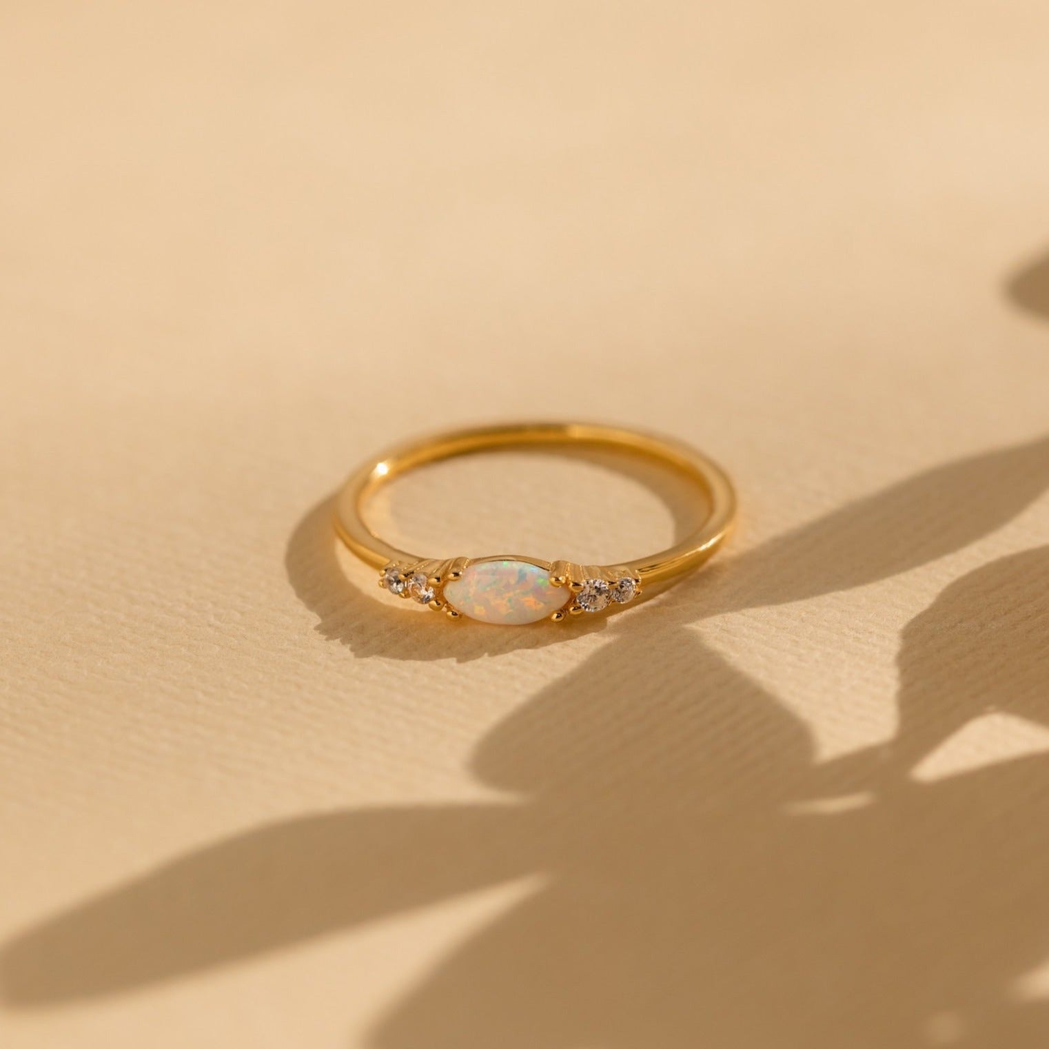 Radiant Elegance: Marquise Opal and Diamond Ring