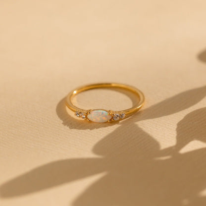 Radiant Elegance: Marquise Opal and Diamond Ring
