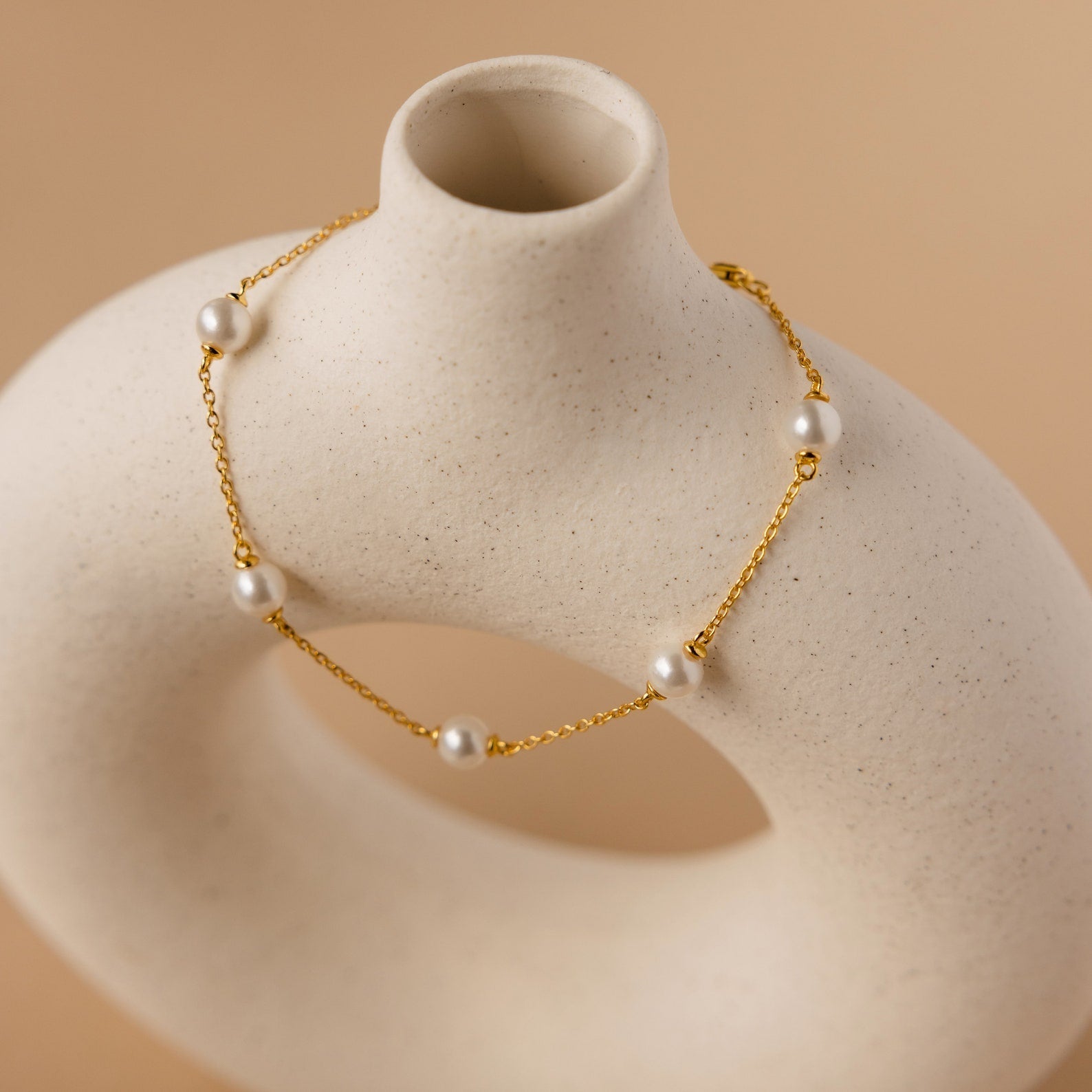 Timeless Beauty: Pearl Station Bracelet