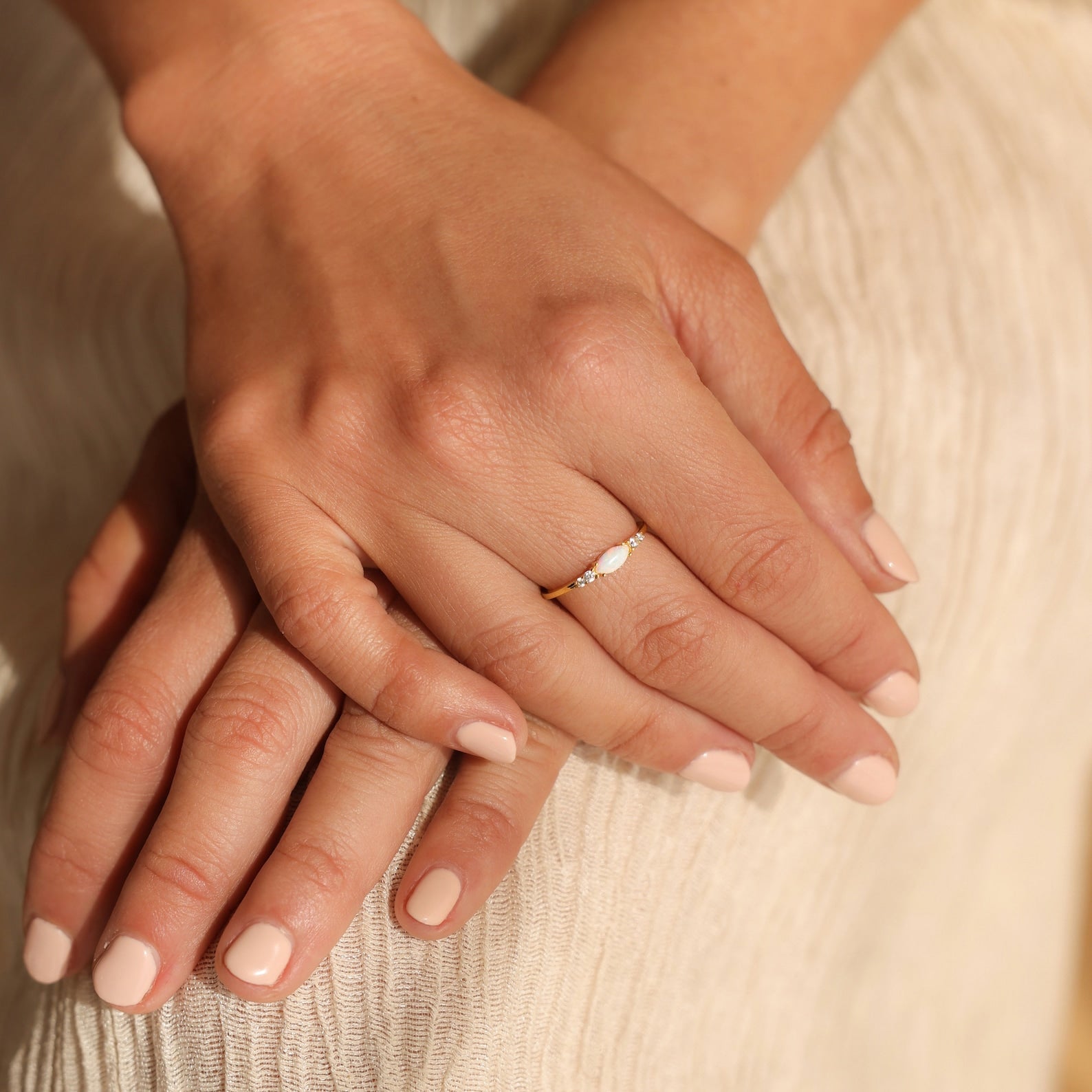 Radiant Elegance: Marquise Opal and Diamond Ring