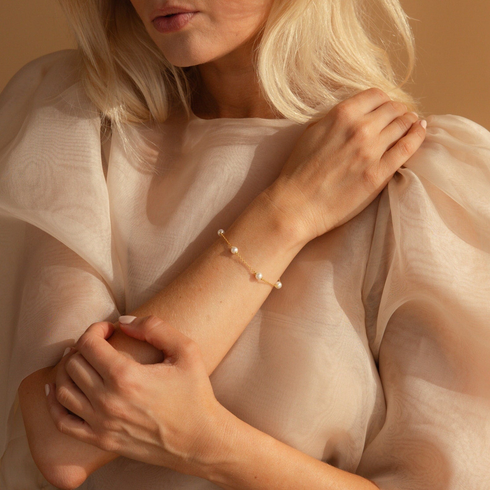 Timeless Beauty: Pearl Station Bracelet