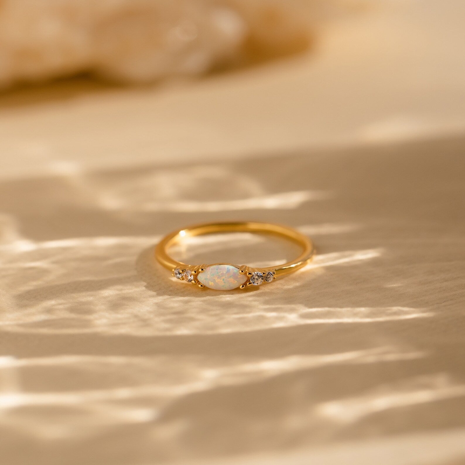 Radiant Elegance: Marquise Opal and Diamond Ring