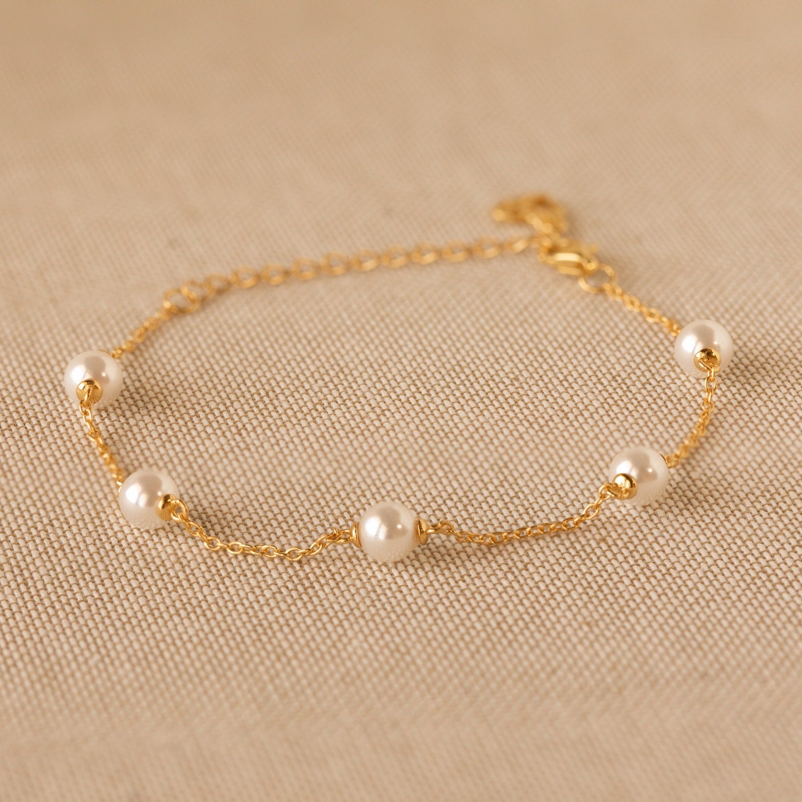 Timeless Beauty: Pearl Station Bracelet