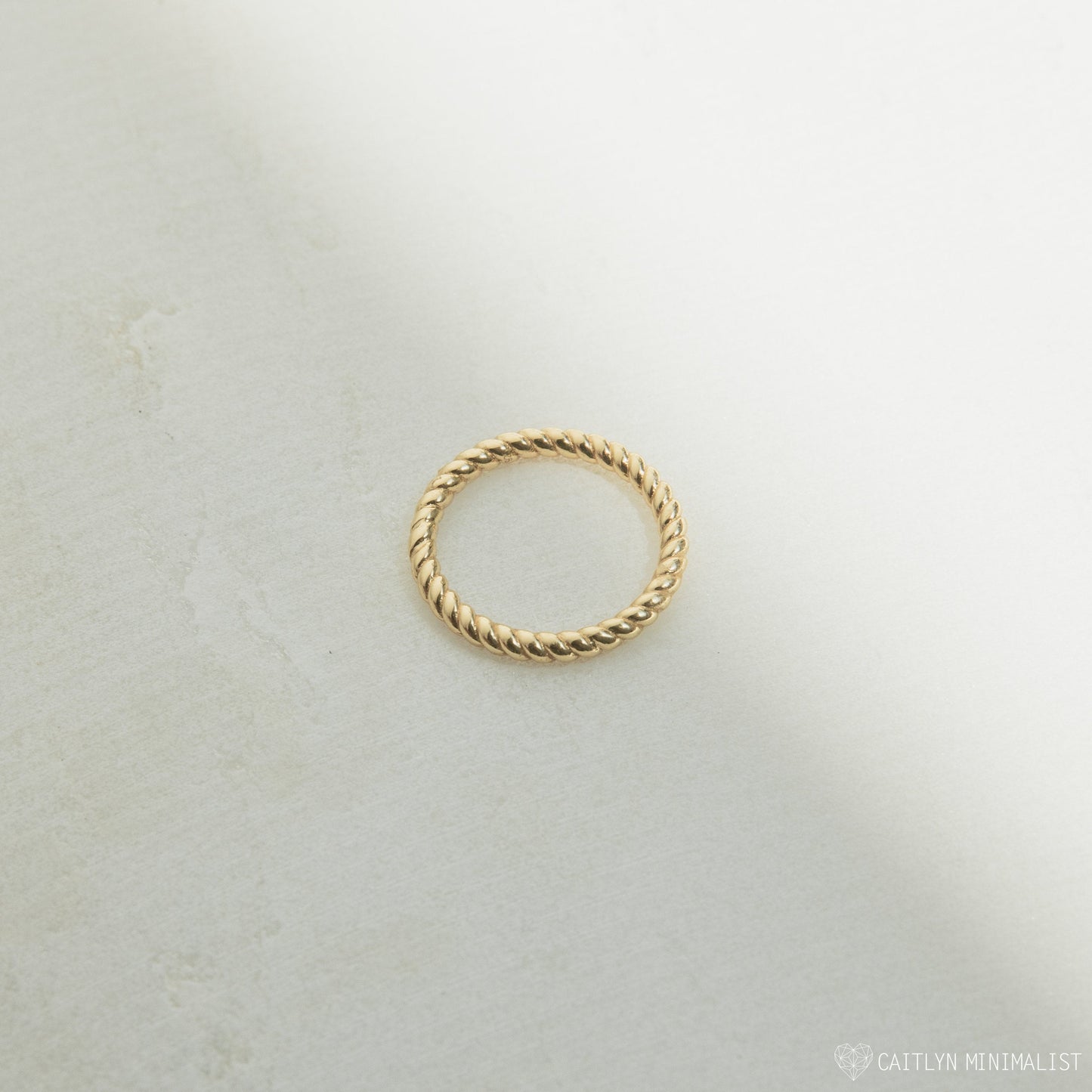 Lea Twisted Band Ring: Effortless Elegance with a Twist