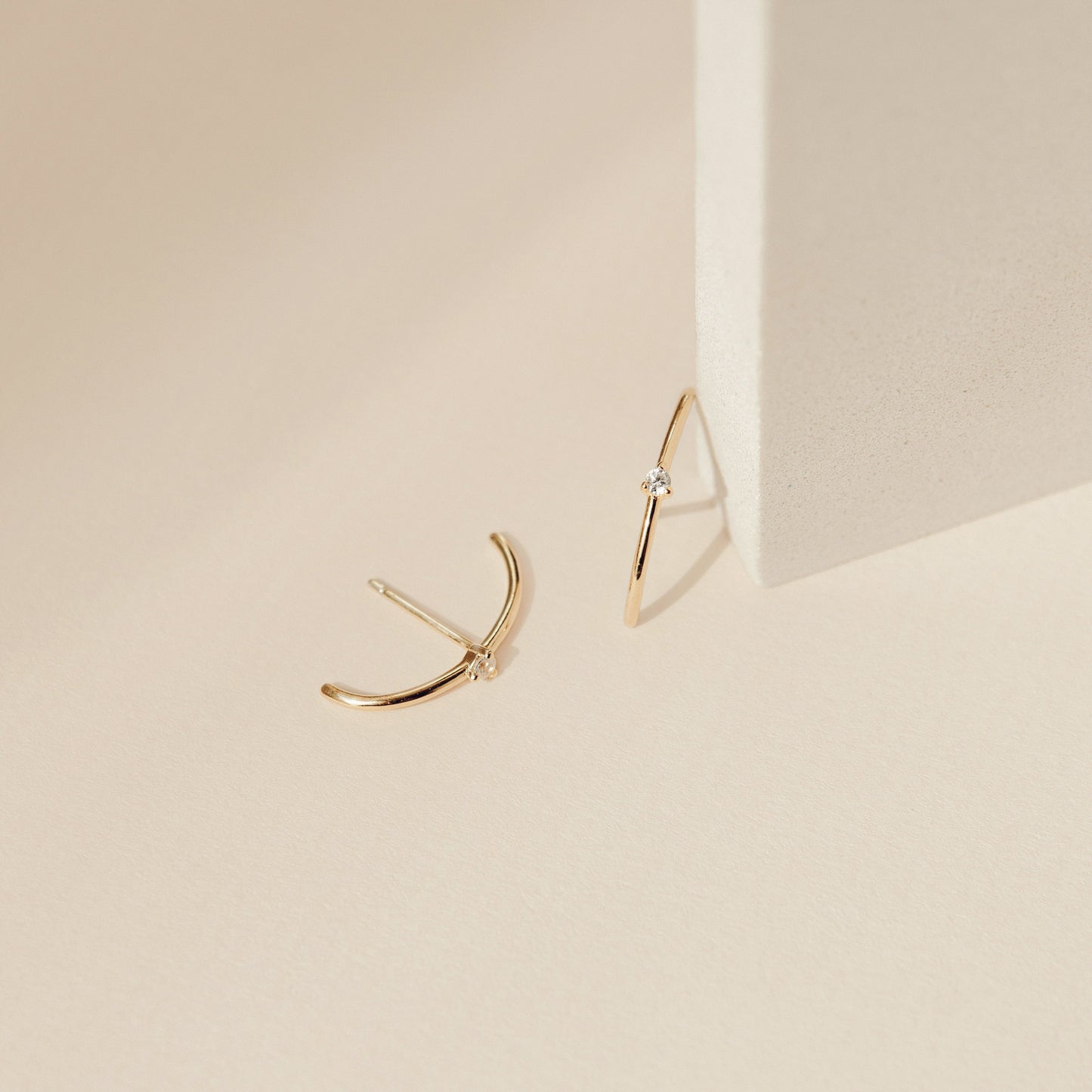 Sleek Sophistication: Arc Diamond Stud Earrings