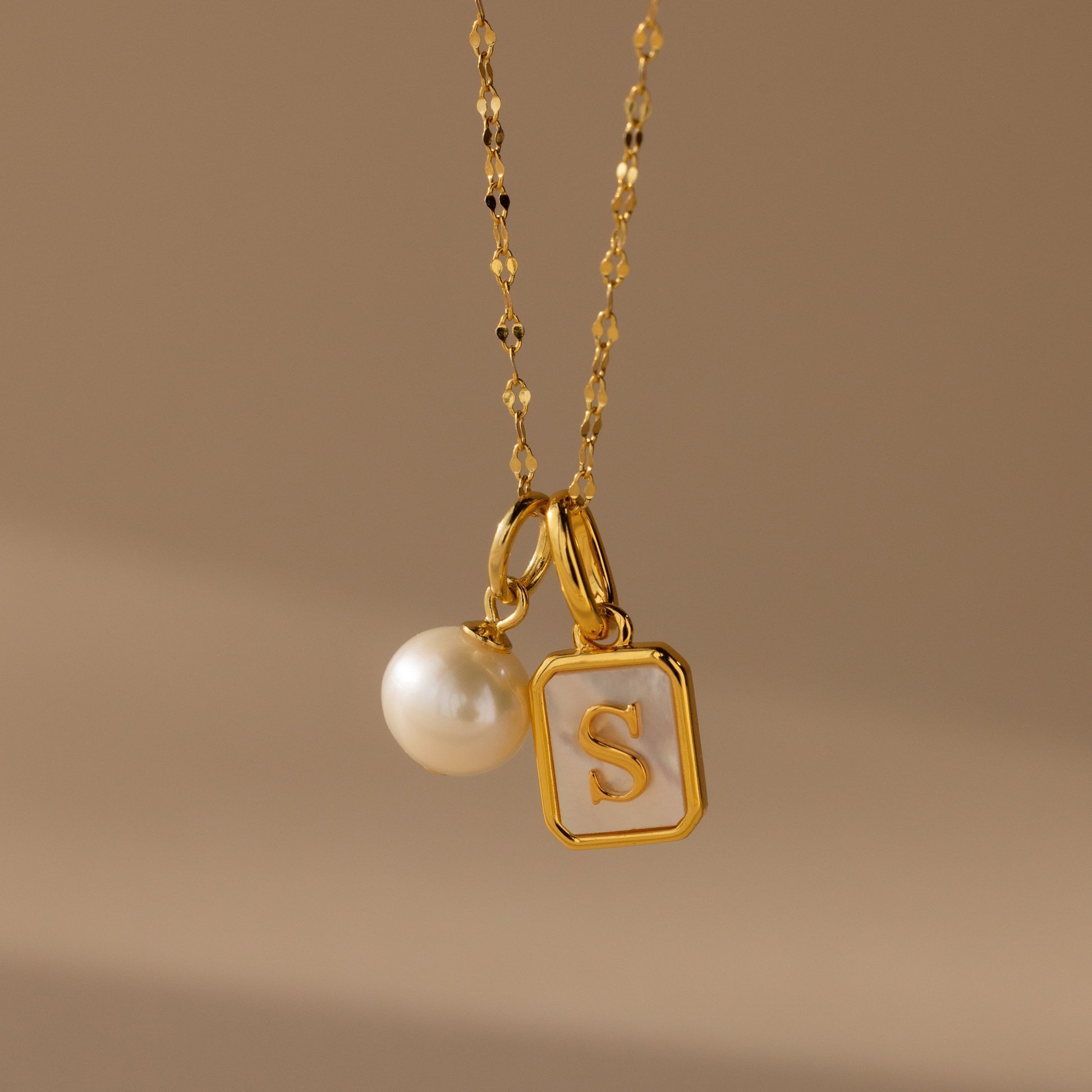 Versatile Elegance: Pearl Charm Pendant