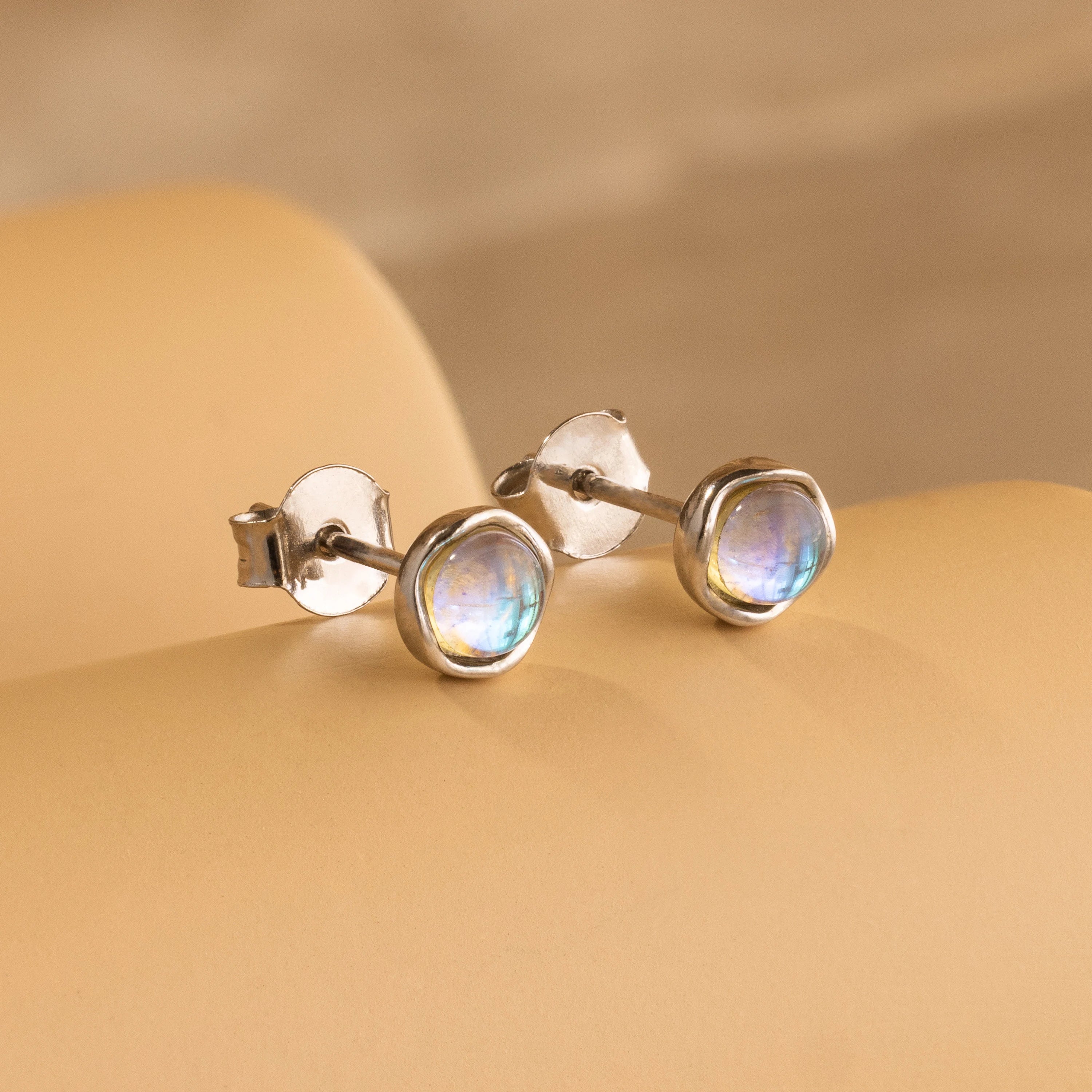 Elegant sterling silver moonstone stud earrings.