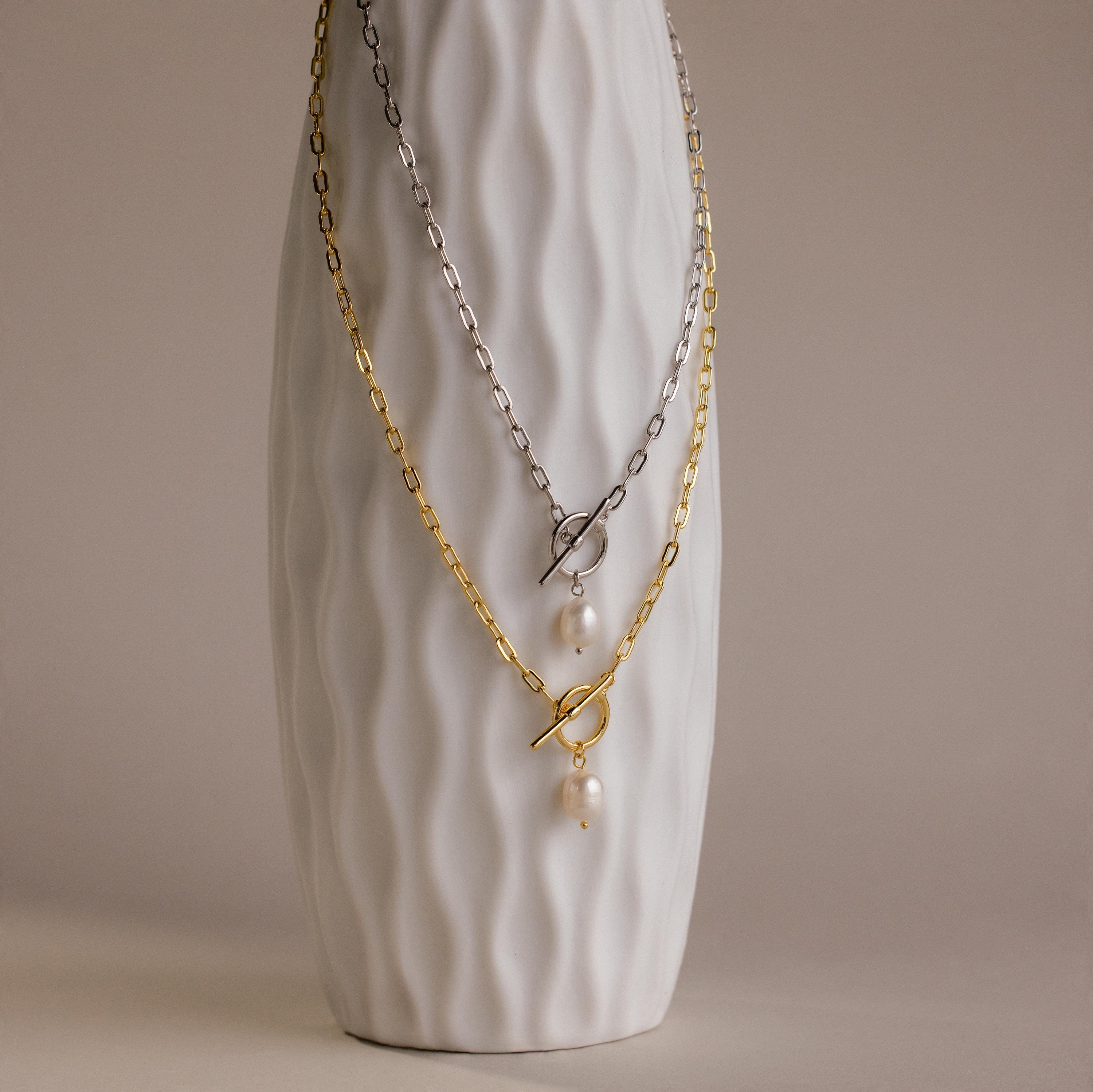 Modern paperclip chain necklace with a single freshwater pearl and toggle clasp