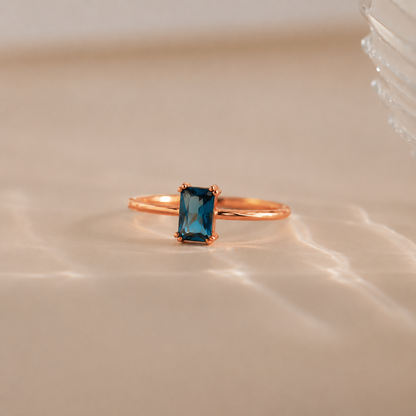 Blue Topaz Emerald Ring