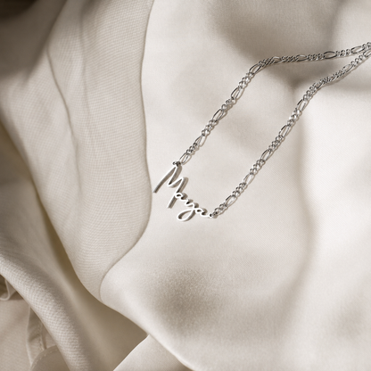 Make a Statement with the Carrie Name Necklace in Figaro Chain