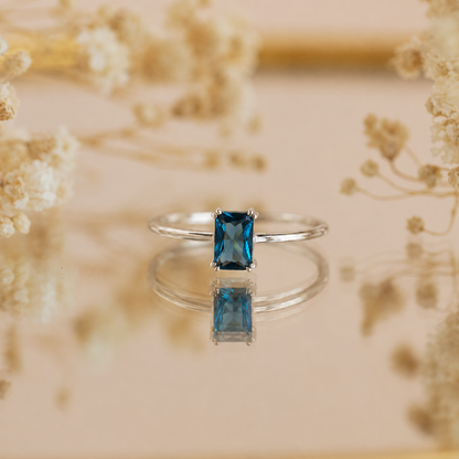 Blue Topaz Emerald Ring