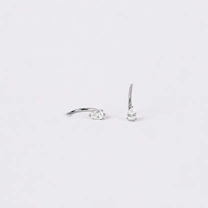 Black handbag with a chain detail on a white background