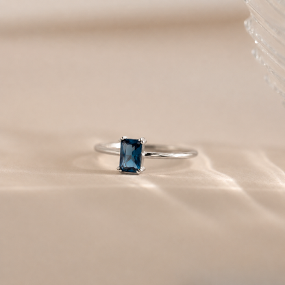 Blue Topaz Emerald Ring